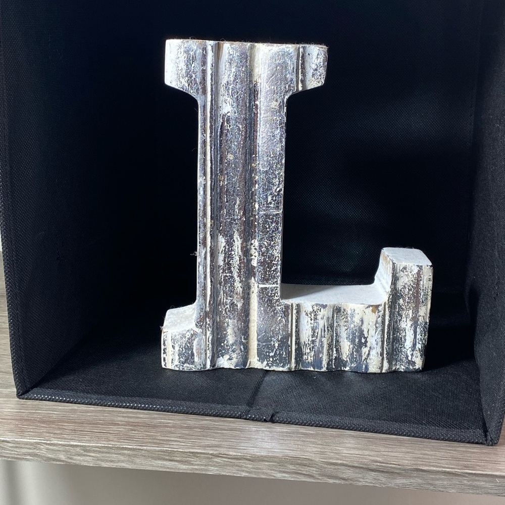 Silver and White Distressed “L”